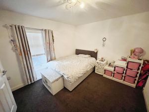 Bedroom One- click for photo gallery